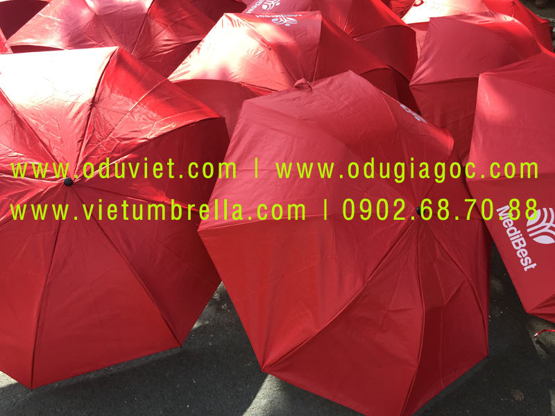 xưởng sản xuất ô dù cầm tay in logo quảng cáo